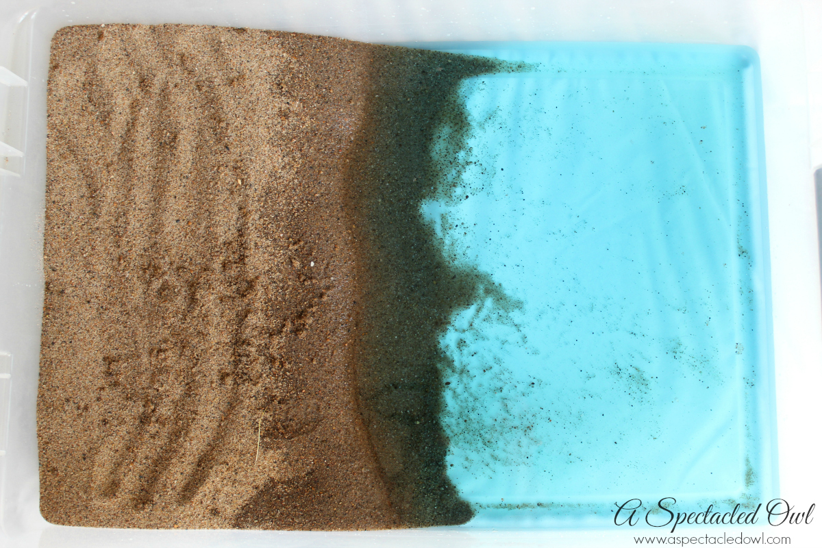 Beach Sensory Bin - If you're not able to go to the beach, why not bring the beach to you? This Beach Sensory Bin is fun to make and lots of fun to play with! The shovels and beach toys can easily be found at your local dollar store and the sand is inexpensive too! The bin in the picture used approximately 25 pounds of play sand. I purchased a 50-pound bag of play sand at Lowe’s in the garden section for under $5. Have fun and let your imagination run wild!